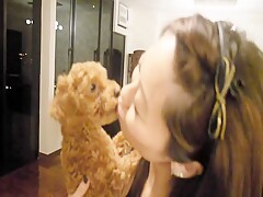 Girl kissing dog